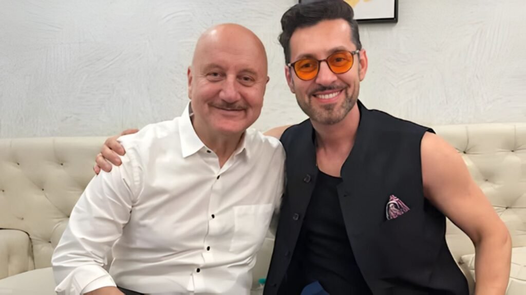A Heartwarming Moment: Anupam Kher Gifts Jacket to Max Amini, Who Responds ‘Jai Ho’