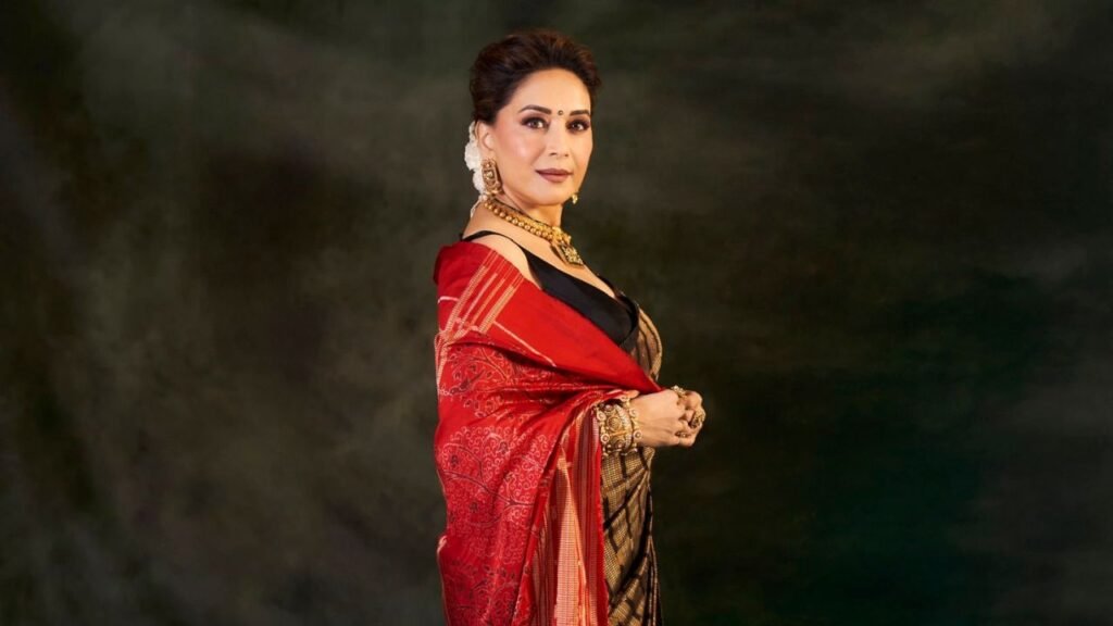 Madhuri Dixit Revives Heritage Elegance in a Mustard and Black Sonepuri Silk Saree