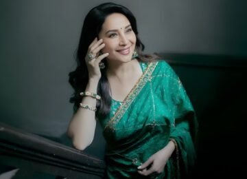 Madhuri Dixit Redefines Wedding Glamour in Bottle Green Saree