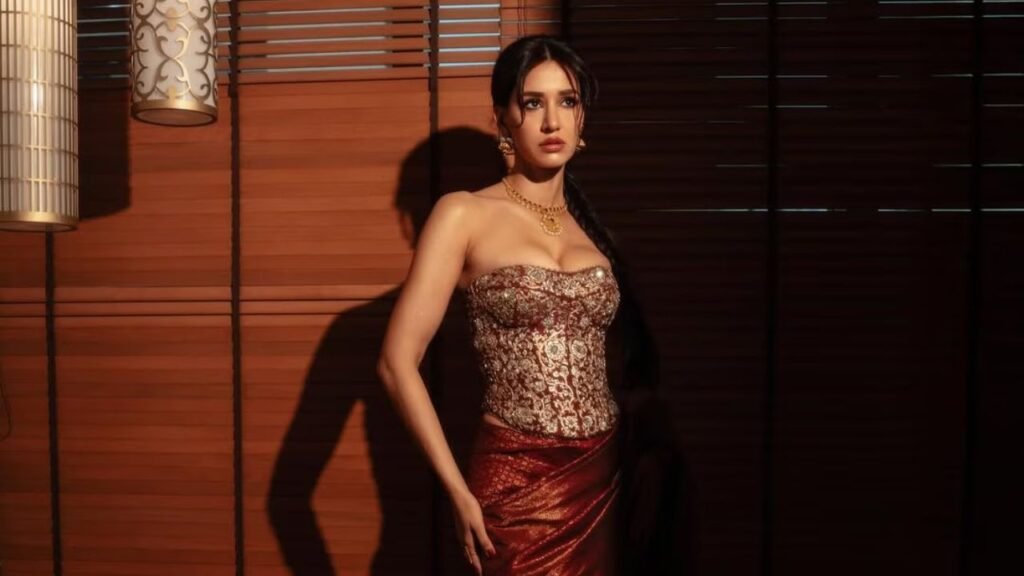 Disha Patani Sets The Internet Ablaze In Tarun Tahiliani’s Fiery Red Corset Saree