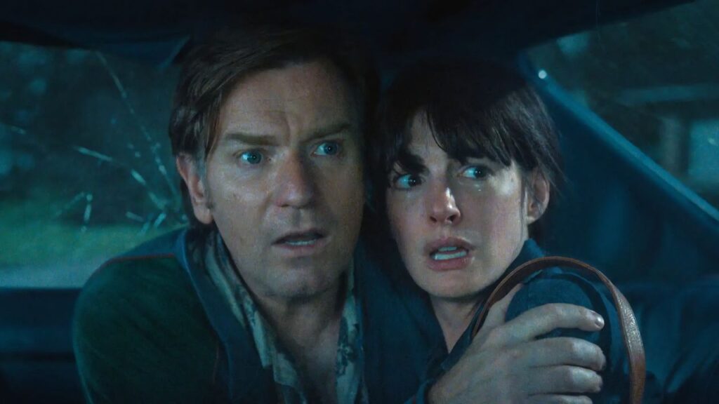 Anne Hathaway Faces Dinosaurs, Mystery and Chaos in Explosive The End of Oak Street Trailer