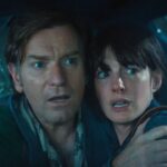 Anne Hathaway Faces Dinosaurs, Mystery and Chaos in Explosive The End of Oak Street Trailer