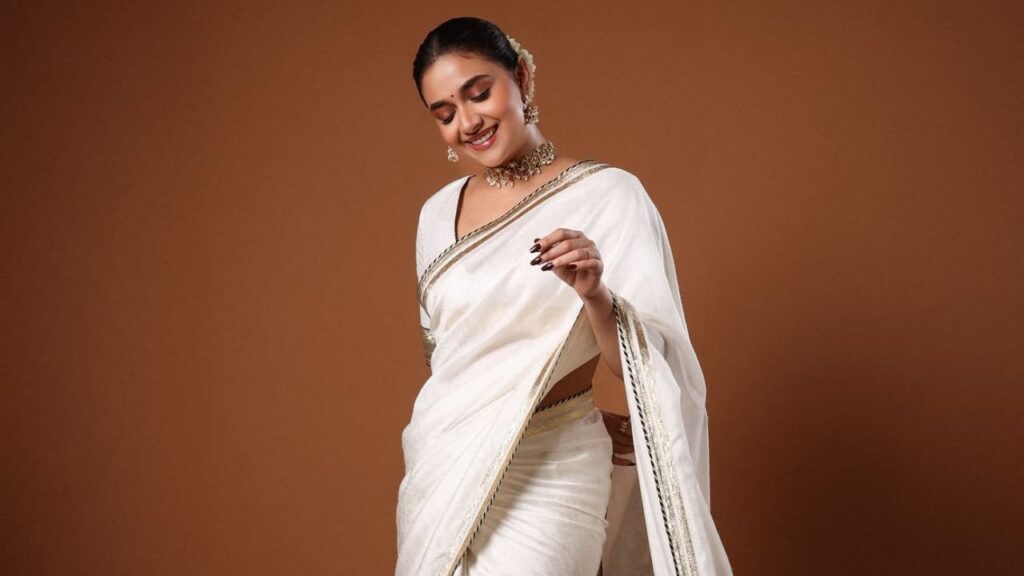 Keerthy Suresh Stuns In Elegant White Saree And Aprajita Toor Heels At Movie Trailer Launch