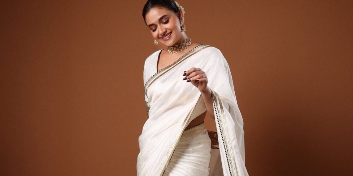 Keerthy Suresh Stuns In Elegant White Saree And Aprajita Toor Heels At Movie Trailer Launch