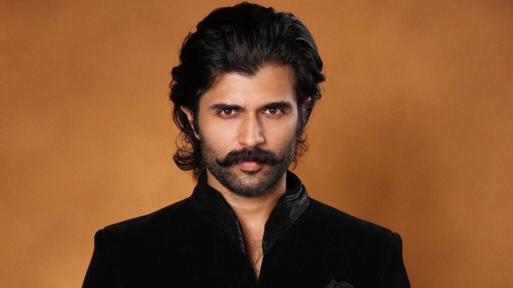 Vijay Deverakonda makes a regal statement in an all-black Amit Aggarwal ensemble for a wedding, styled by Harmann Kaur. See his latest fashion look.