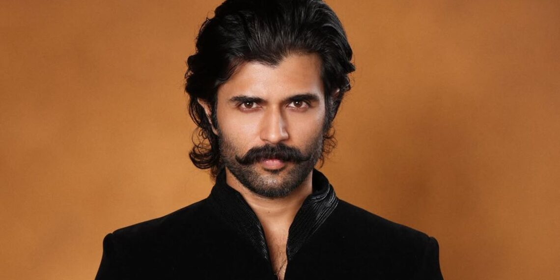 Vijay Deverakonda makes a regal statement in an all-black Amit Aggarwal ensemble for a wedding, styled by Harmann Kaur. See his latest fashion look.