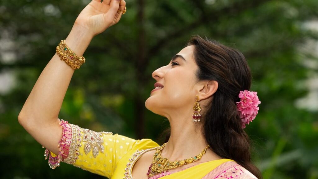 Sara Ali Khan’s Navratri Look: Yellow Silk Saree, Pink Border and Statement Gold Jewellery